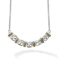 Five white topaz gemstones accent this necklace surrounded by sterling silver and 18k gold Caviar beading.