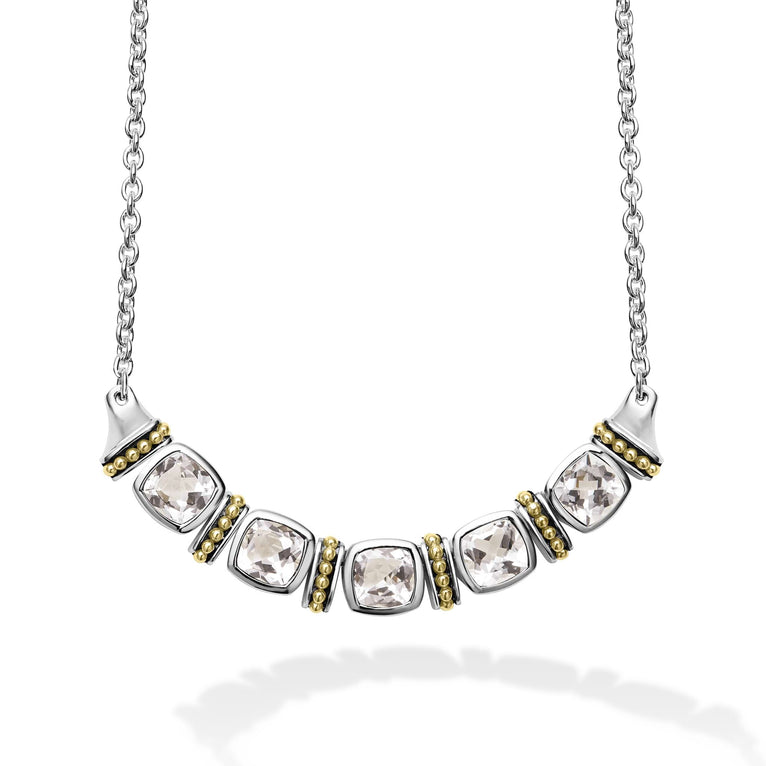 Five white topaz gemstones accent this necklace surrounded by sterling silver and 18k gold Caviar beading.