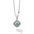 A swiss blue topaz gemstone surrounded by sterling silver and 18K gold Caviar beading form this pendant. Finished on a versatile link necklace with six sterling silver Caviar beaded stations.