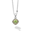 A peridot gemstone surrounded by sterling silver and 18K gold Caviar beading form this pendant. Finished on a versatile link necklace with six sterling silver Caviar beaded stations.