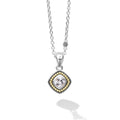 A white topaz gemstone surrounded by sterling silver and 18k gold Caviar beading form this pendant. Finished on a versatile link necklace.