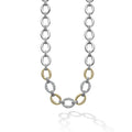 Three pavé diamond links, 18k gold and sterling silver create this classic link necklace. LAGOS diamonds are the highest quality natural stones.