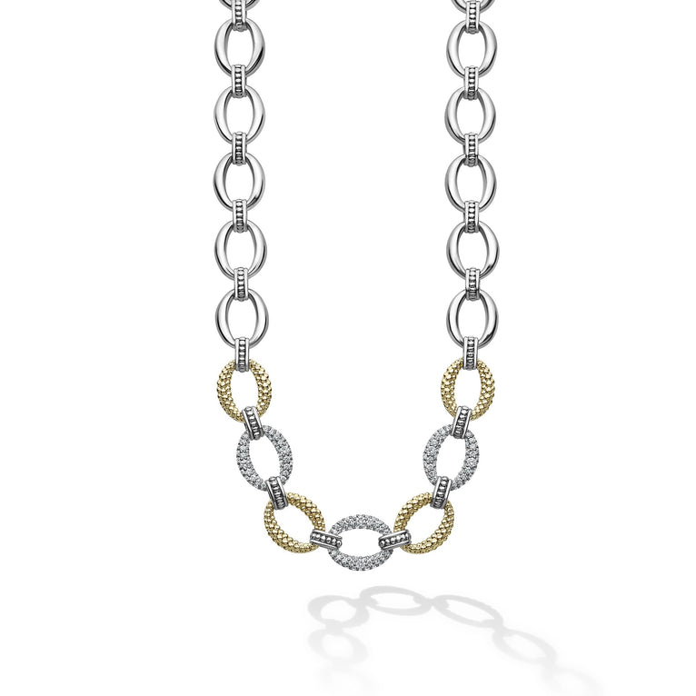 Three pavé diamond links, 18k gold and sterling silver create this classic link necklace. LAGOS diamonds are the highest quality natural stones.
