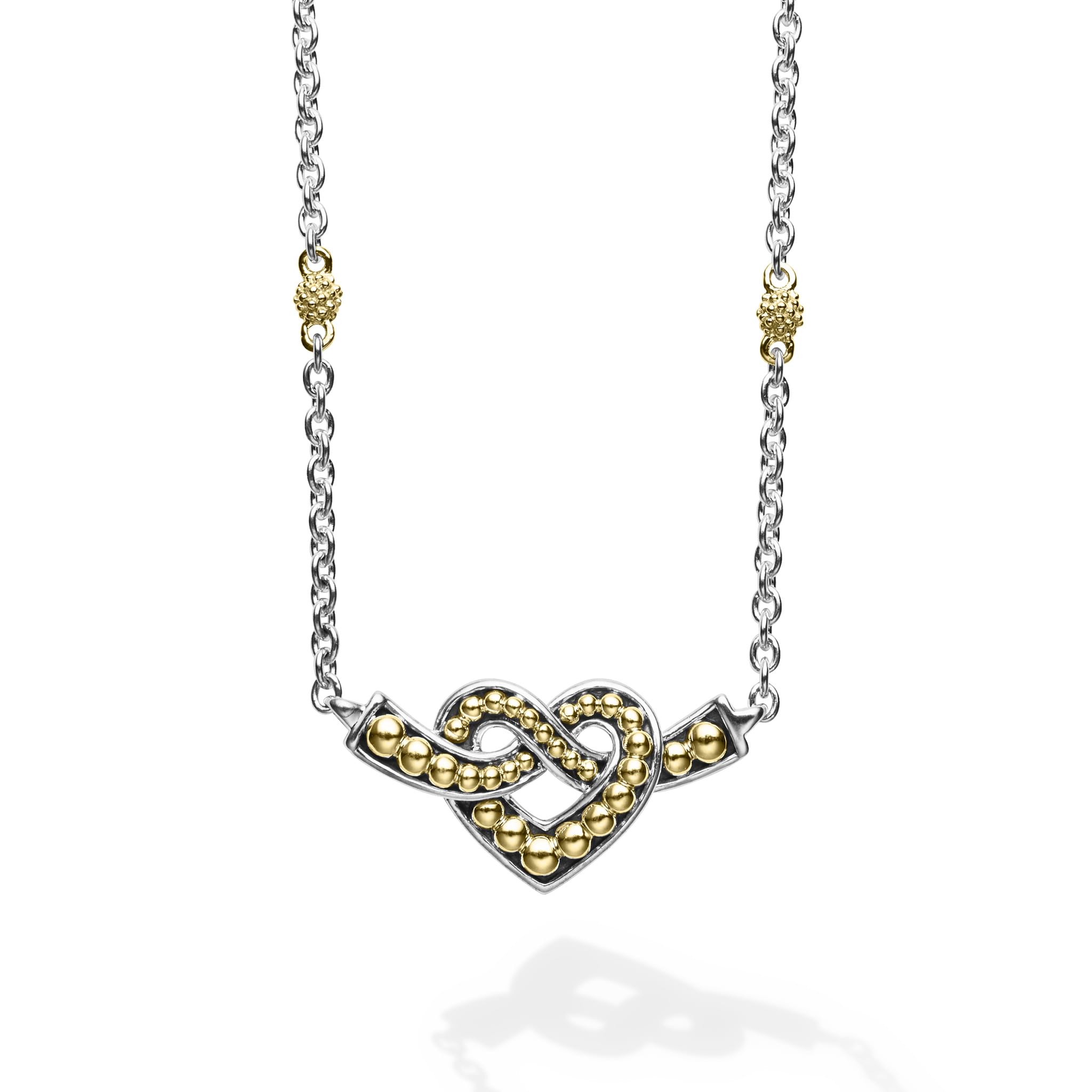 Sterling silver and 18k gold intertwine to form this unique Beloved heart finished on a versatile link necklace with six Caviar beaded stations.