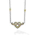 Sterling silver and 18k gold intertwine to form this unique Beloved heart finished on a versatile link necklace with six Caviar beaded stations.