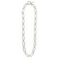 Signature Caviar Two-Tone Link Necklace featuring sterling silver and 18K gold links with caviar beading, showcasing a toggle clasp for an elegant, layered look.