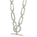 Signature Caviar Two-Tone Link Necklace in sterling silver and 18K gold, featuring elongated links with caviar beading and a toggle-bar clasp stamped “LAGOS.”