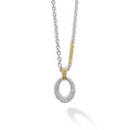 Pavé diamonds form this oval pendant that is finished on a signature sterling silver Caviar necklace with 18k gold accents. LAGOS diamonds are the highest quality natural stones.