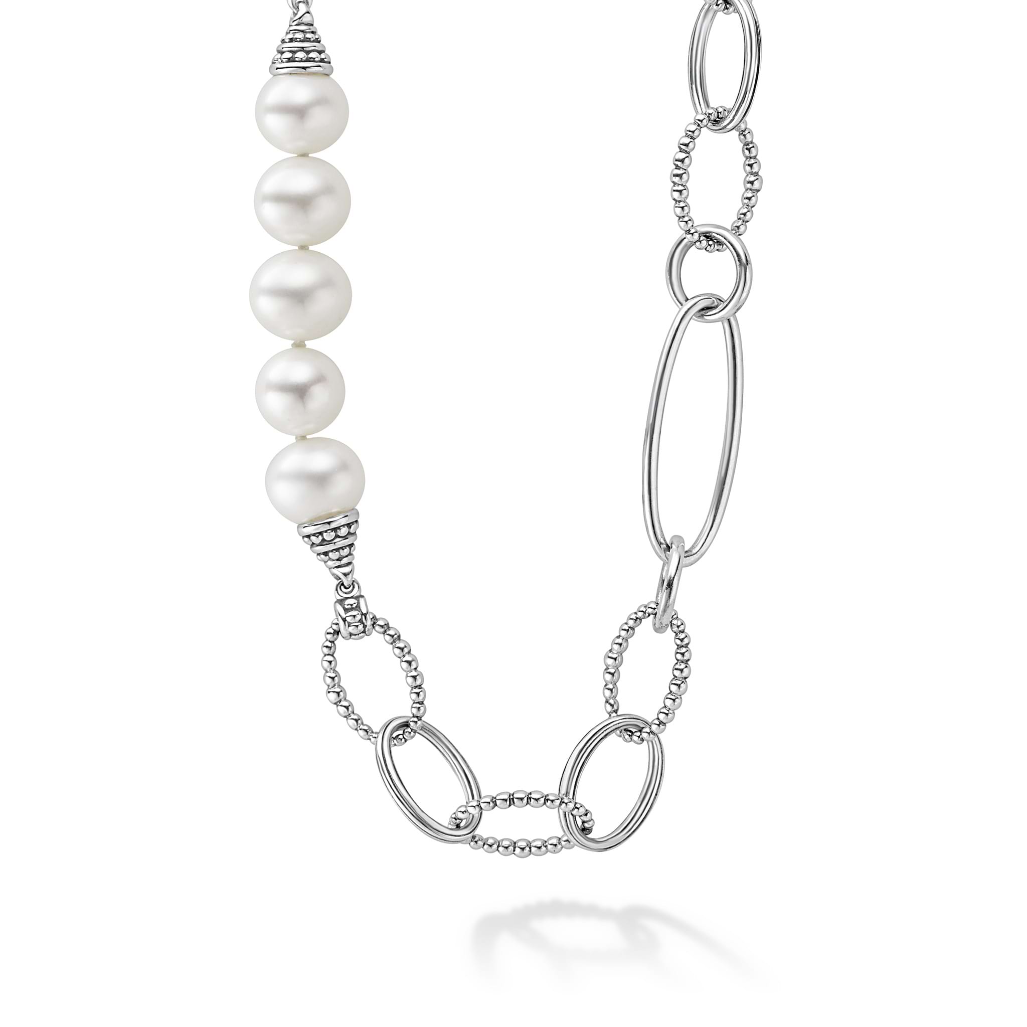 Five cultured freshwater pearl stations on a signature sterling silver Caviar beaded link necklace.
