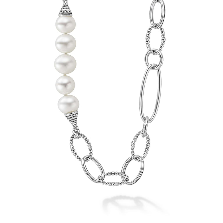 Five cultured freshwater pearl stations on a signature sterling silver Caviar beaded link necklace.