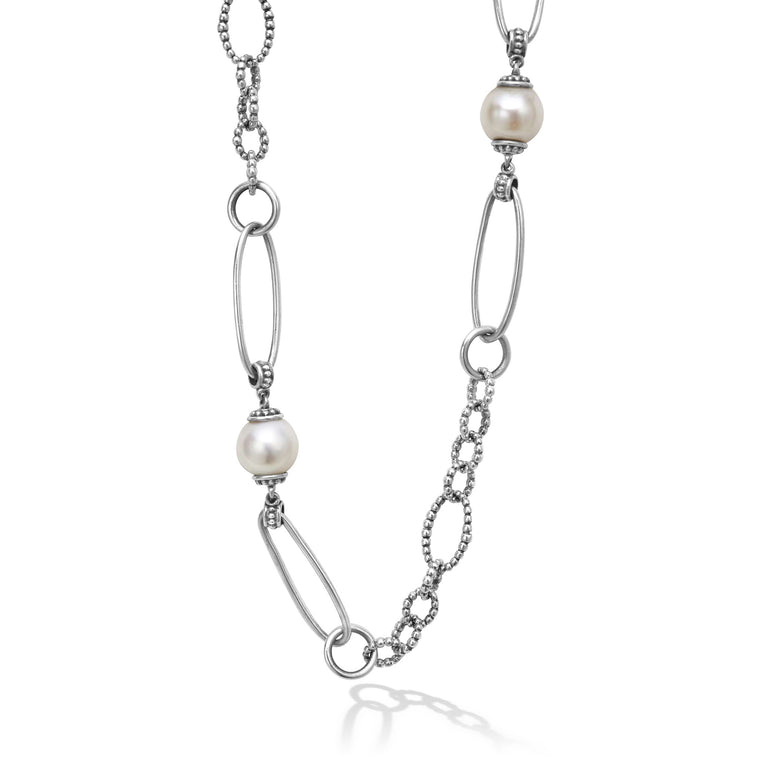 Five cultured freshwater pearl stations on a signature sterling silver Caviar beaded link necklace.