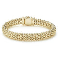 Signature Caviar beading forms this 18K gold bracelet.
