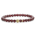 Garnet gemstone bracelet with an 18K gold Caviar beaded station that is ideal to style with various bracelets for a unique look.