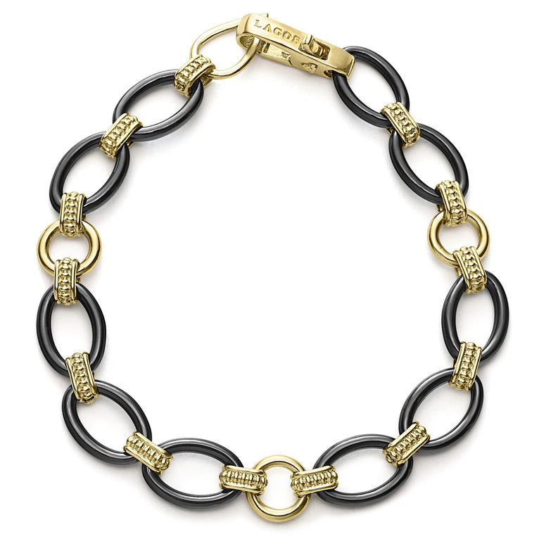 A classic bracelet with 18K gold and black ceramic oval and beaded links.