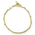 18k gold superfine Caviar beaded link bracelet finished with a toggle clasp.