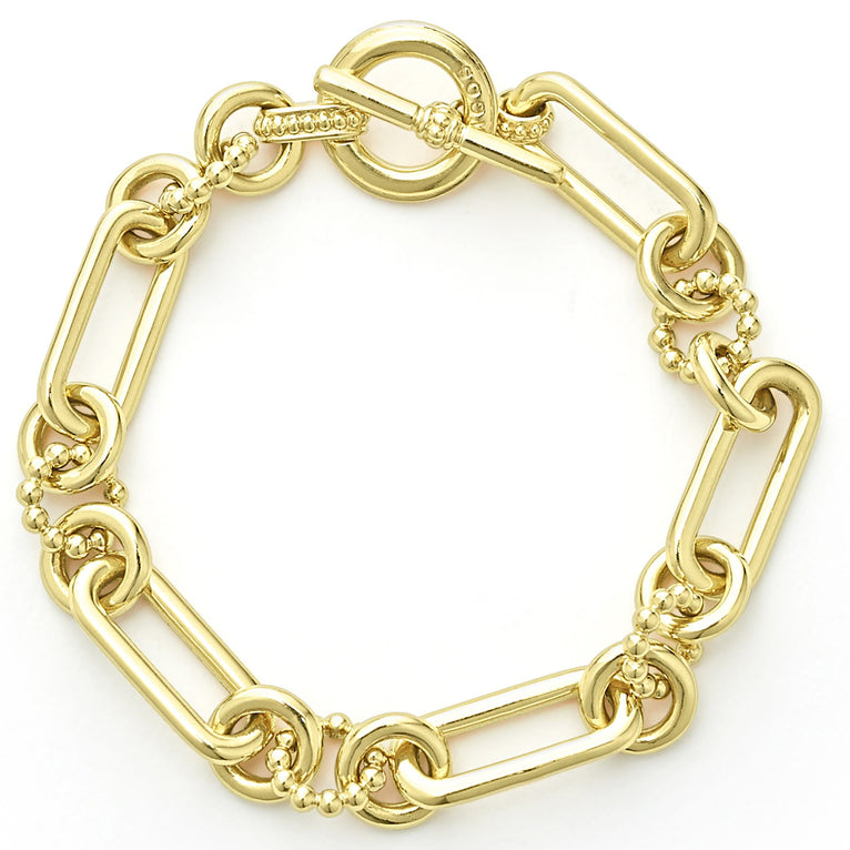 18K gold variations of Caviar beading & fluting elements form this bold link bracelet.