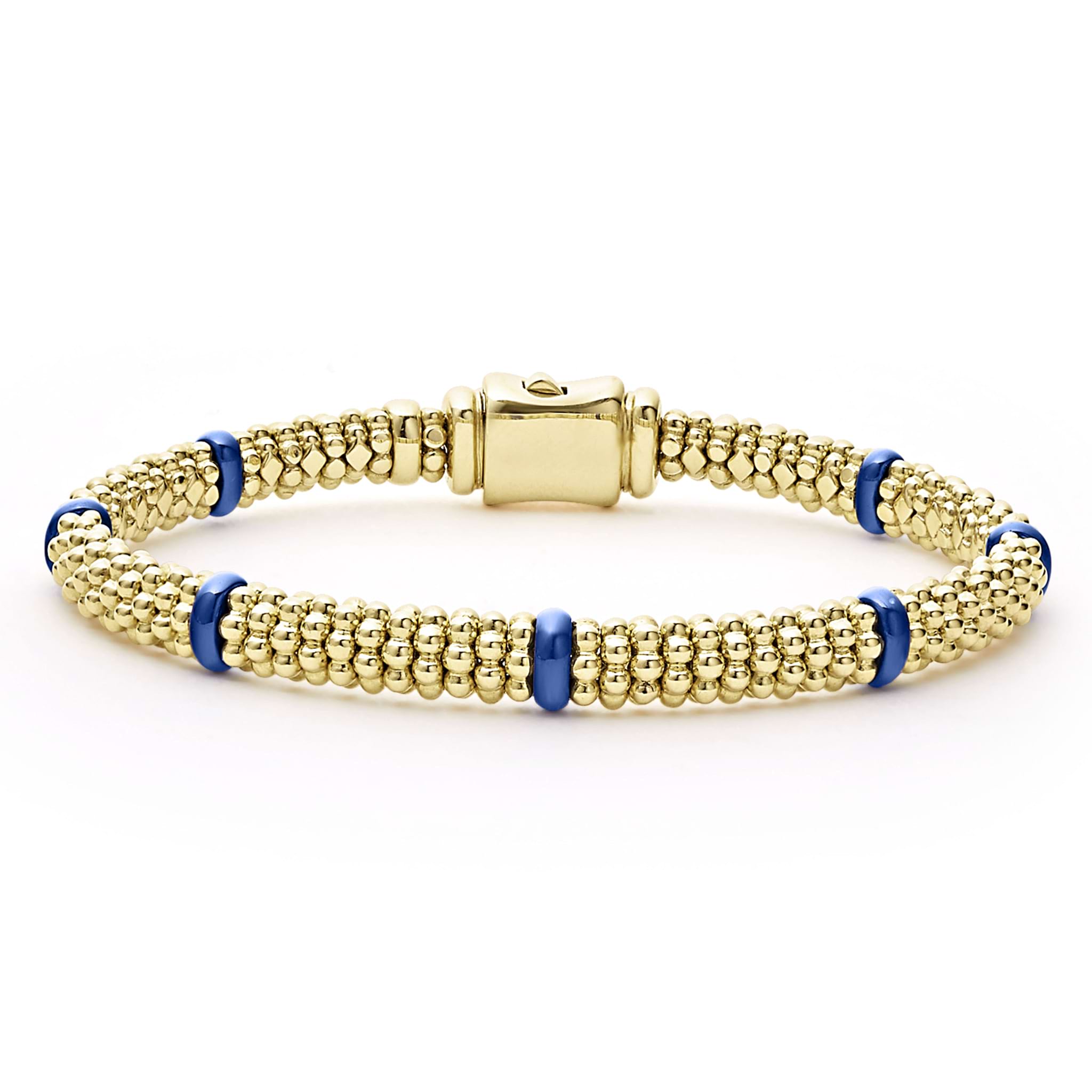 Seven smooth ultramarine ceramic stations highlight 18k gold Caviar beading on this signature bracelet.