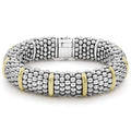 A best-selling signature bracelet with sterling silver Caviar beading and ten 18K gold stations.