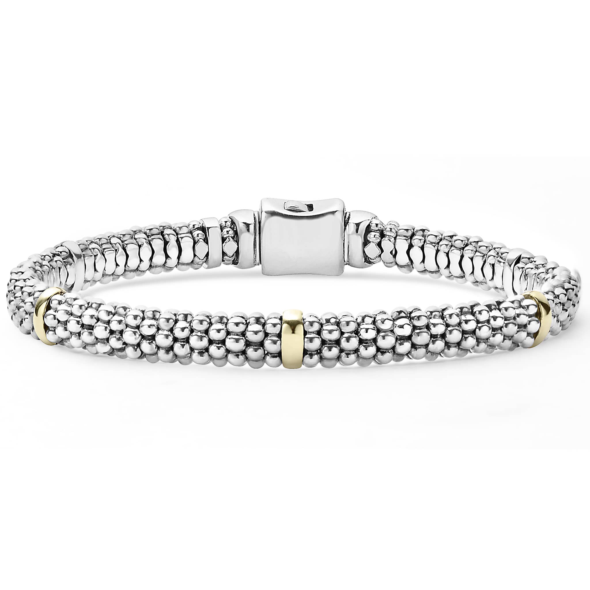 Five 18k gold stations with sterling silver Caviar beading form this signature bracelet.