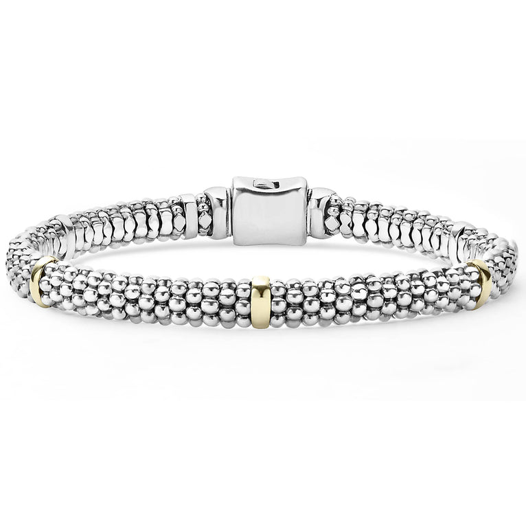 Five 18k gold stations with sterling silver Caviar beading form this signature bracelet.