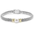 A sterling silver Caviar bracelet with freshwater cultured pearl framed by two 18K gold x stations.