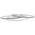 Three sterling silver round bangles join to form this versatile bracelet. Two bangles of Caviar beading and one with a sugarloaf motif.