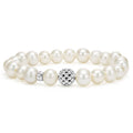 Pearl bracelet with a sterling silver Caviar beaded station.