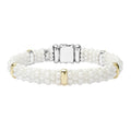 A white Caviar ceramic beaded bracelet with five 18K gold stations.