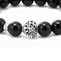 Keep Memory Alive Black Agate Silver Station Bead Bracelet with glossy black beads and a silver geometric spacer, benefiting Keep Memory Alive.