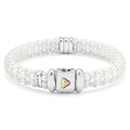 White Caviar Single Station Ceramic Diamond Bracelet 9mm features multi-strand white ceramic beads, a sterling silver clasp with gold emblem, and a diamond-accented silver station.