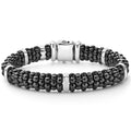 A black Caviar ceramic beaded bracelet with five sterling silver stations.