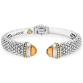 Expertly crafted Caviar beading with highly polished sterling silver stations comprise this innovative bracelet detailing citrine gemstone end caps. Finished with a hinge clasp.