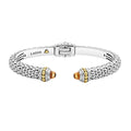 Caviar beading and highly polished sterling silver stations comprise this innovative cuff bracelet detailing citrine gemstone end caps.