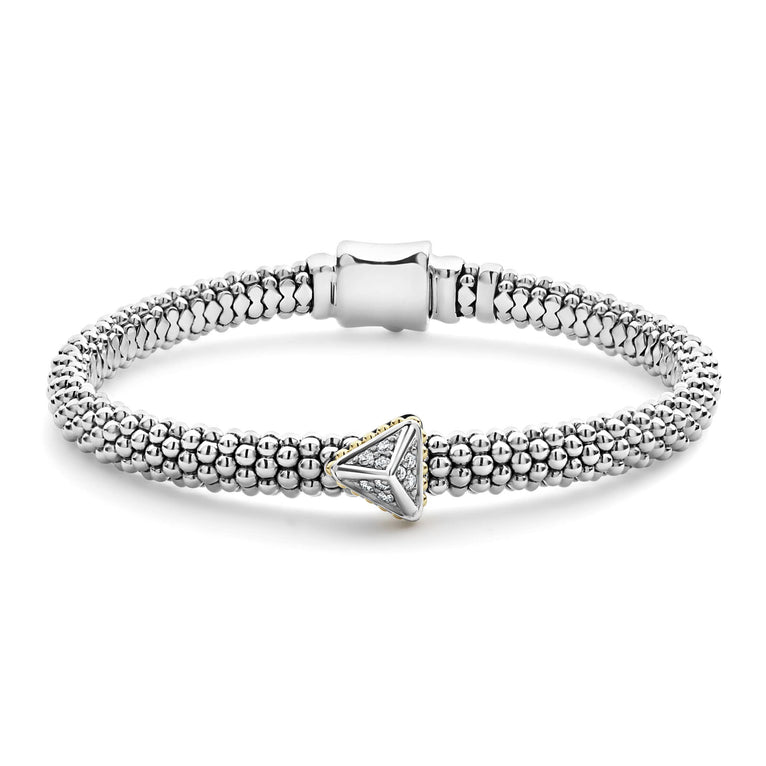 A single diamond pyramid with 18K gold detailing accents this sterling silver Caviar beaded bracelet. LAGOS diamonds are the highest quality natural stones.