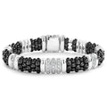 Three diamond stations set in sterling silver surrounded by black ceramic Caviar beading form this bracelet. LAGOS diamonds are the highest quality natural stones.