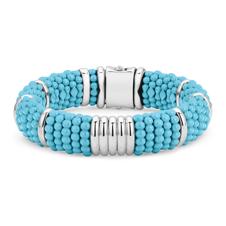 Sleek sterling silver stations and blue ceramic Caviar beading form this statement bracelet.