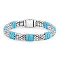 Caviar beading in sterling silver and smooth blue ceramic form this signature bracelet.