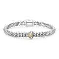 A single 18K gold pyramid accents the sterling silver Caviar beading to form this KSL bracelet.