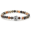 Picasso jasper gemstone beaded bracelet with a sterling silver Caviar skull.