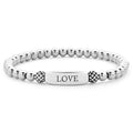 Sterling silver bracelet with a highly polished station with LOVE engraved.