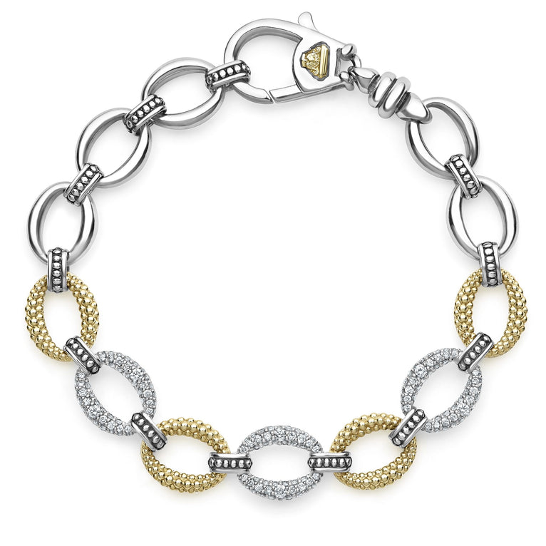 Three pavé diamond links, 18k gold and sterling silver create this classic link bracelet. LAGOS diamonds are the highest quality natural stones.