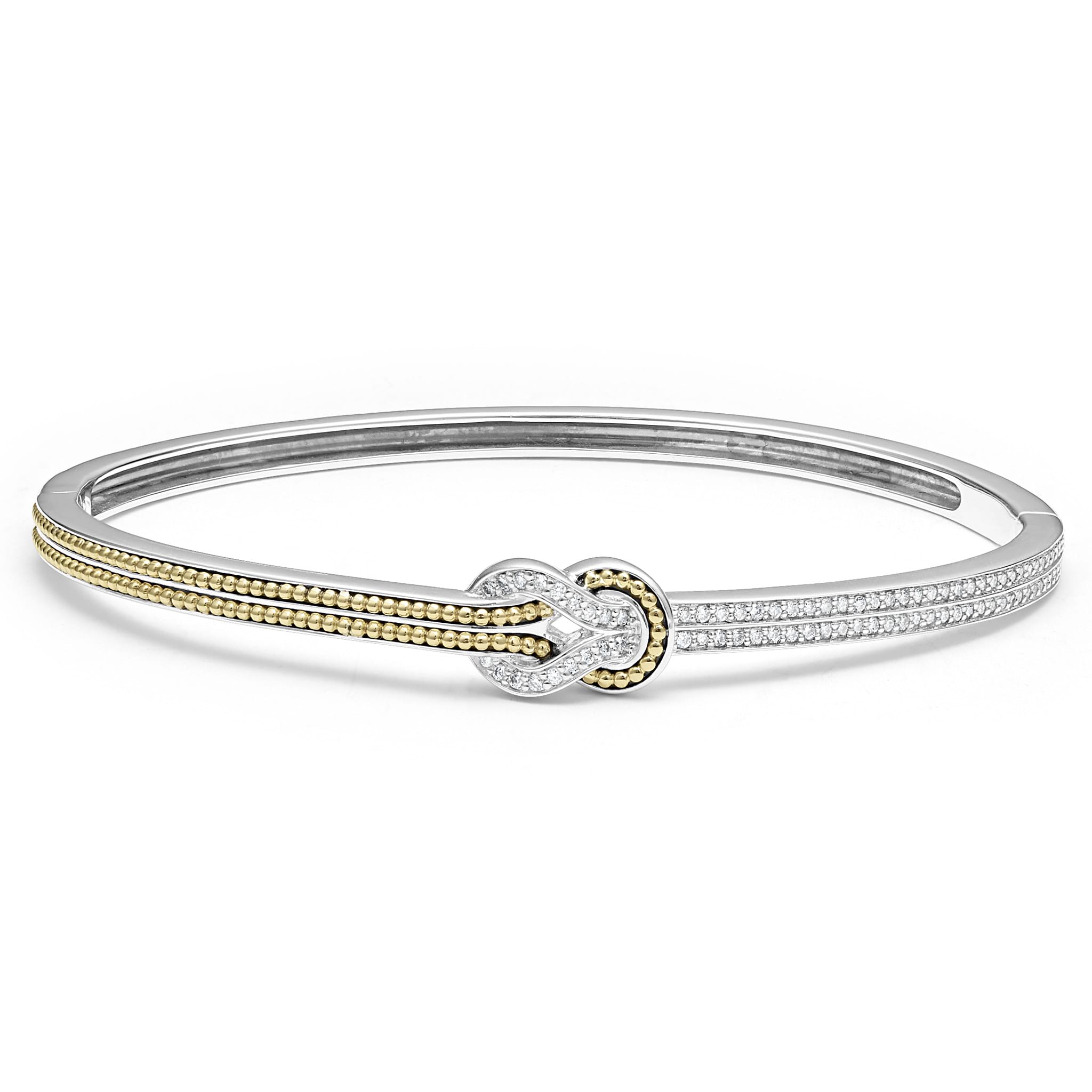 Diamonds and 18K gold woven in a knot motif form this unique Newport cuff bracelet. LAGOS diamonds are the highest quality natural stones.