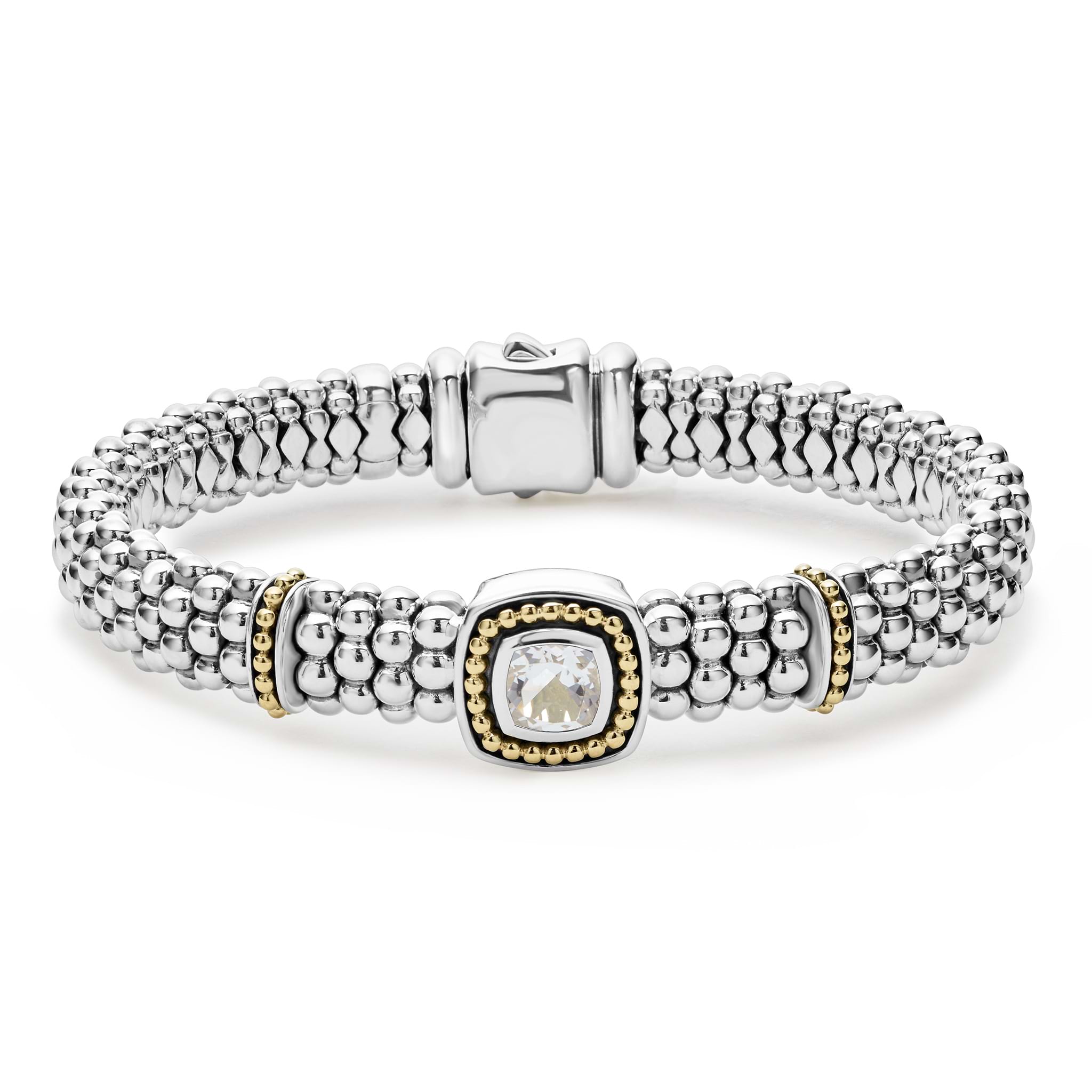 A white topaz gemstone and sterling silver Caviar beading with 18k gold detailing forms this bracelet.