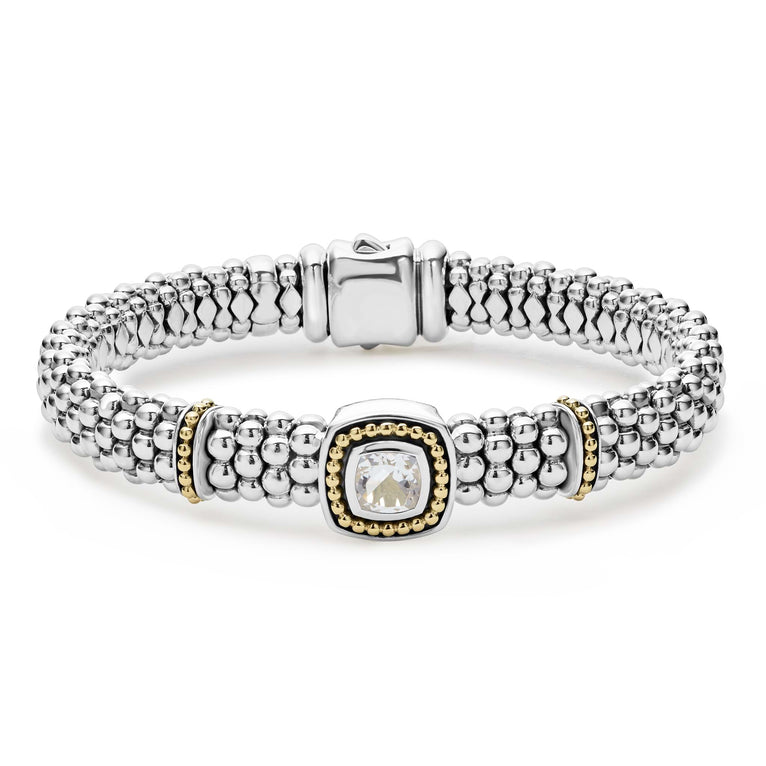 A white topaz gemstone and sterling silver Caviar beading with 18k gold detailing forms this bracelet.