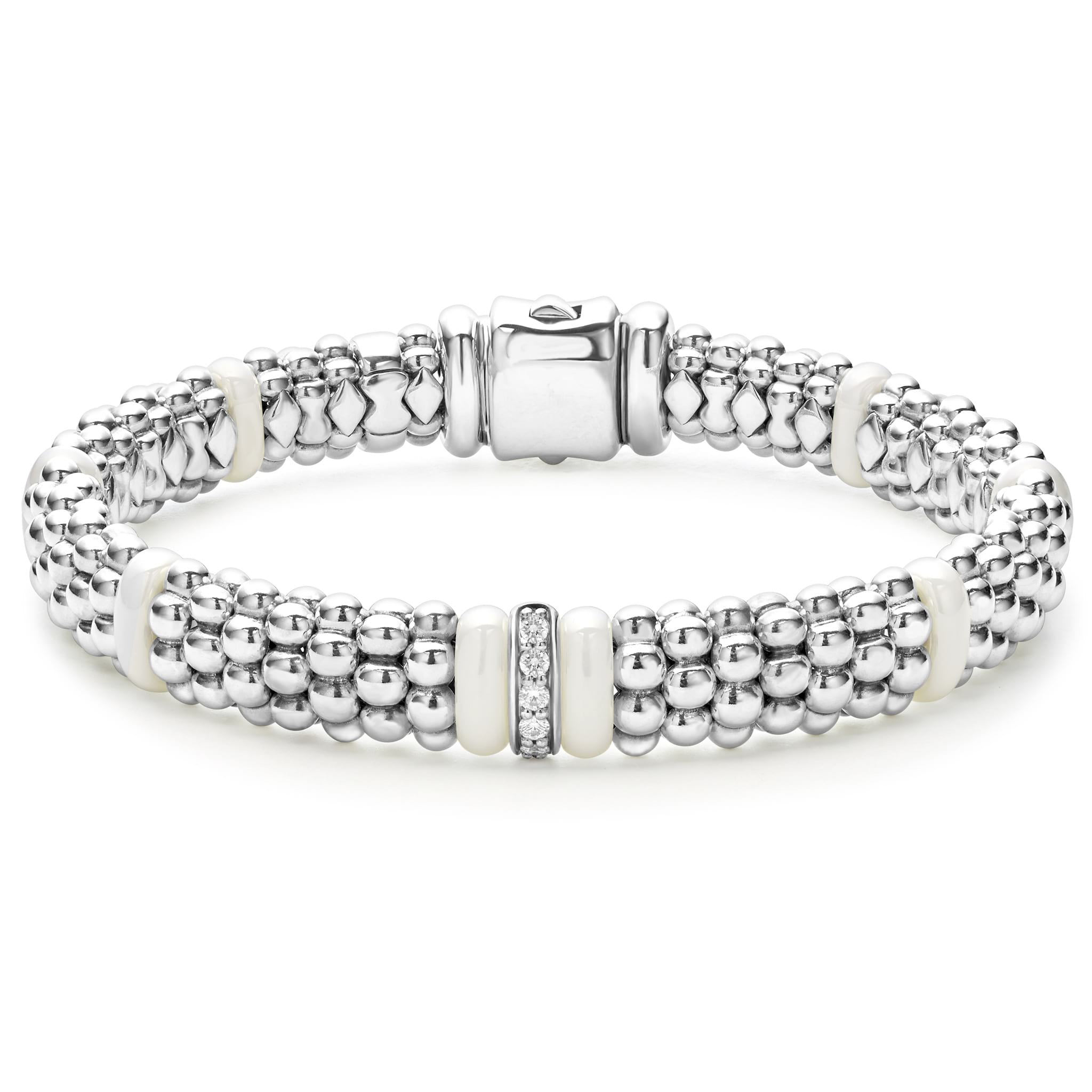 A LAGOS exclusive. A single diamond station set in sterling silver surrounded by white ceramic and Caviar beading. LAGOS diamonds are the highest quality natural stones.