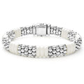 Caviar beading in sterling silver and smooth white ceramic form this signature bracelet.