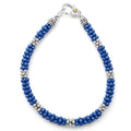 An ultramarine ceramic Caviar bracelet accented by seven sterling silver stations.