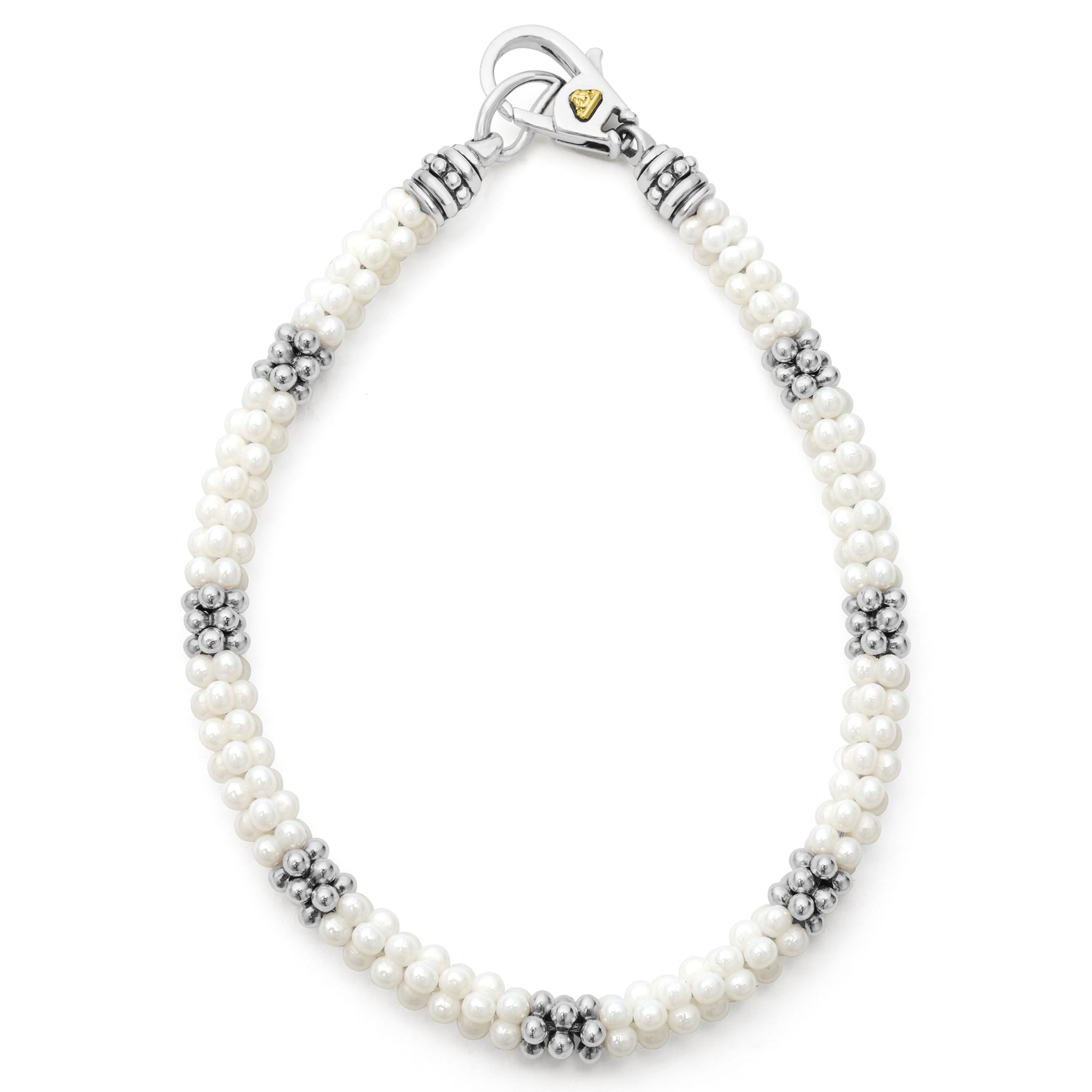 A white ceramic Caviar bracelet accented by seven sterling silver stations.