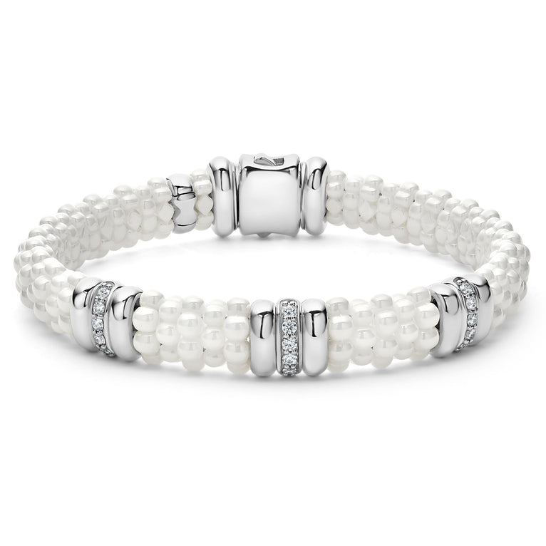 Three diamond and sterling silver stations set in a white ceramic beaded bracelet. LAGOS diamonds are the highest quality natural stones.
