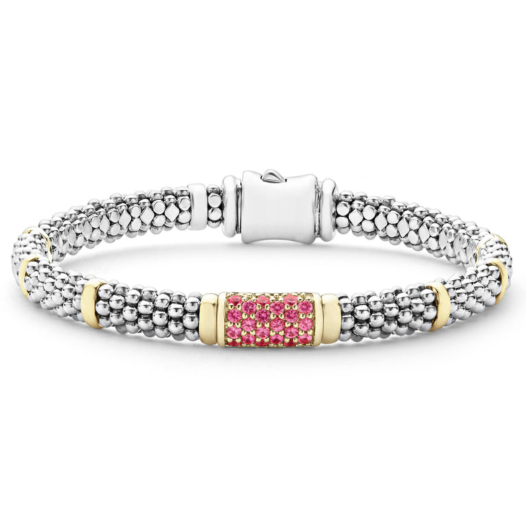 Ten 18K gold stations on this sterling silver Caviar beaded bracelet with pink sapphire precious gemstones set in 18K gold.
